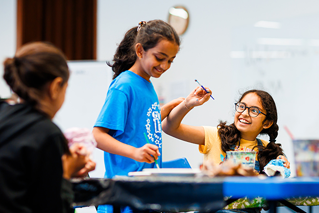 Young girls painting