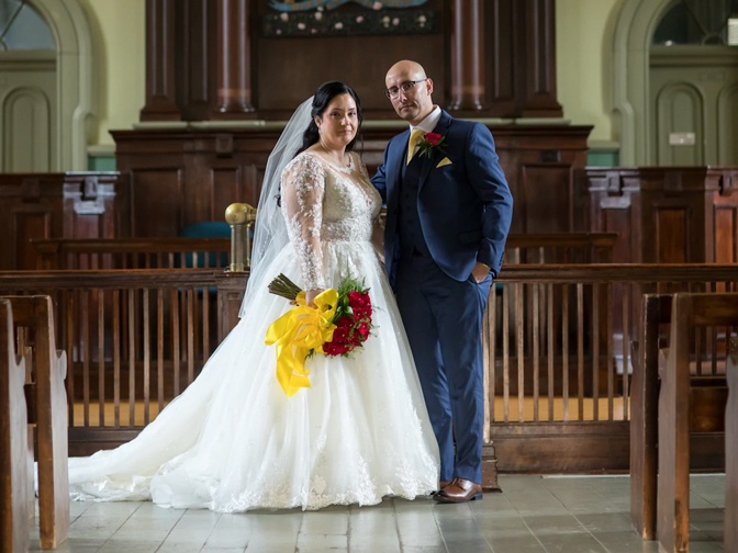 bride and groom in Council Chambers
