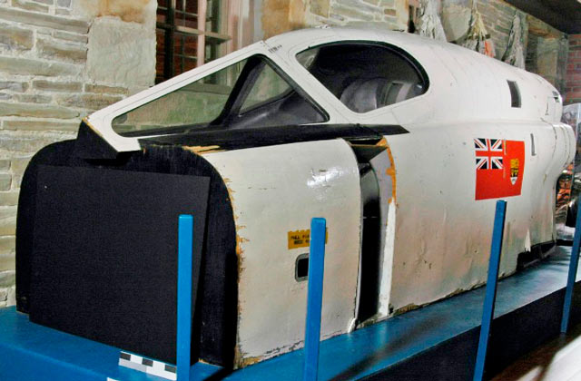 a piece of an airplane displayed in the museum collection